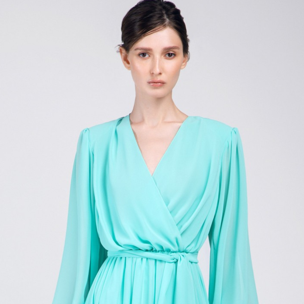 This gown is floor length, pastel green color, long puff sleeves party wear.