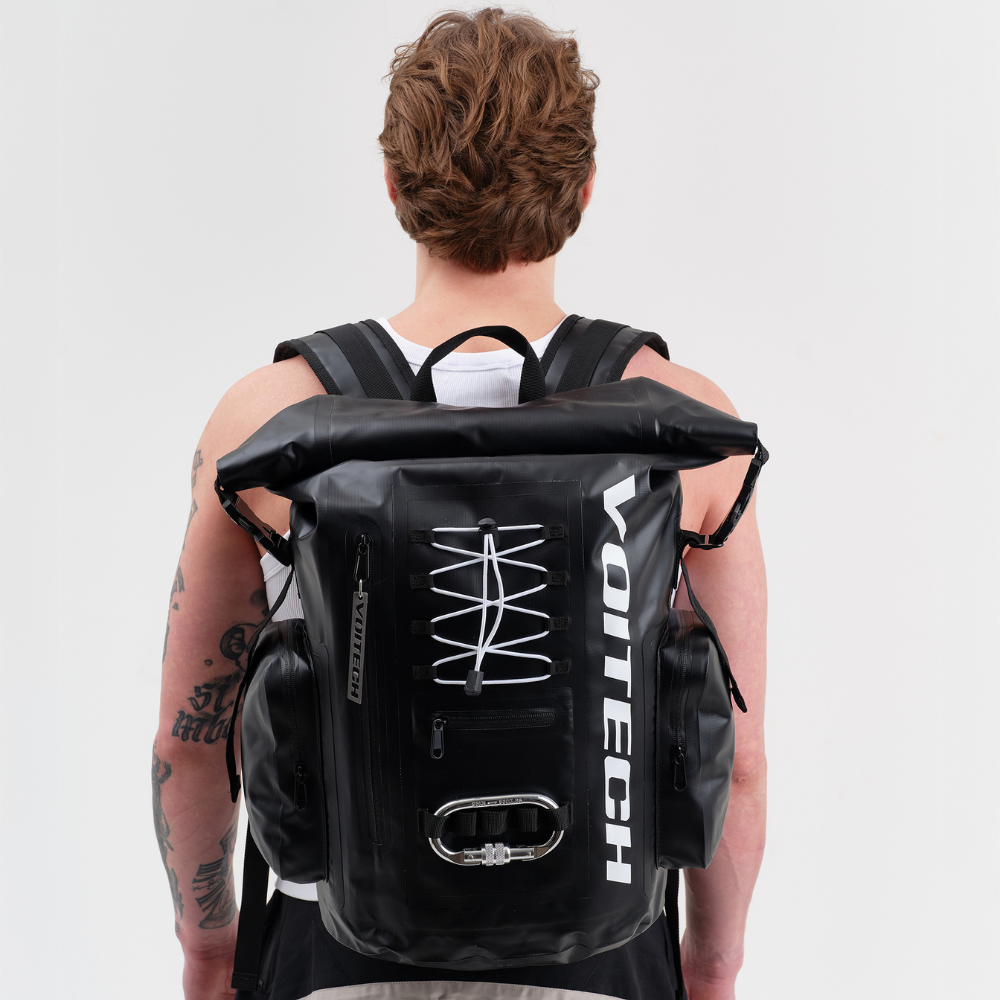 Shop online from our exclusive website and discover the Cryo Backpack by Voitech®, featuring waterproof PVC, welded seams, roll-top closure, and modular utility for technical everyday carry.
