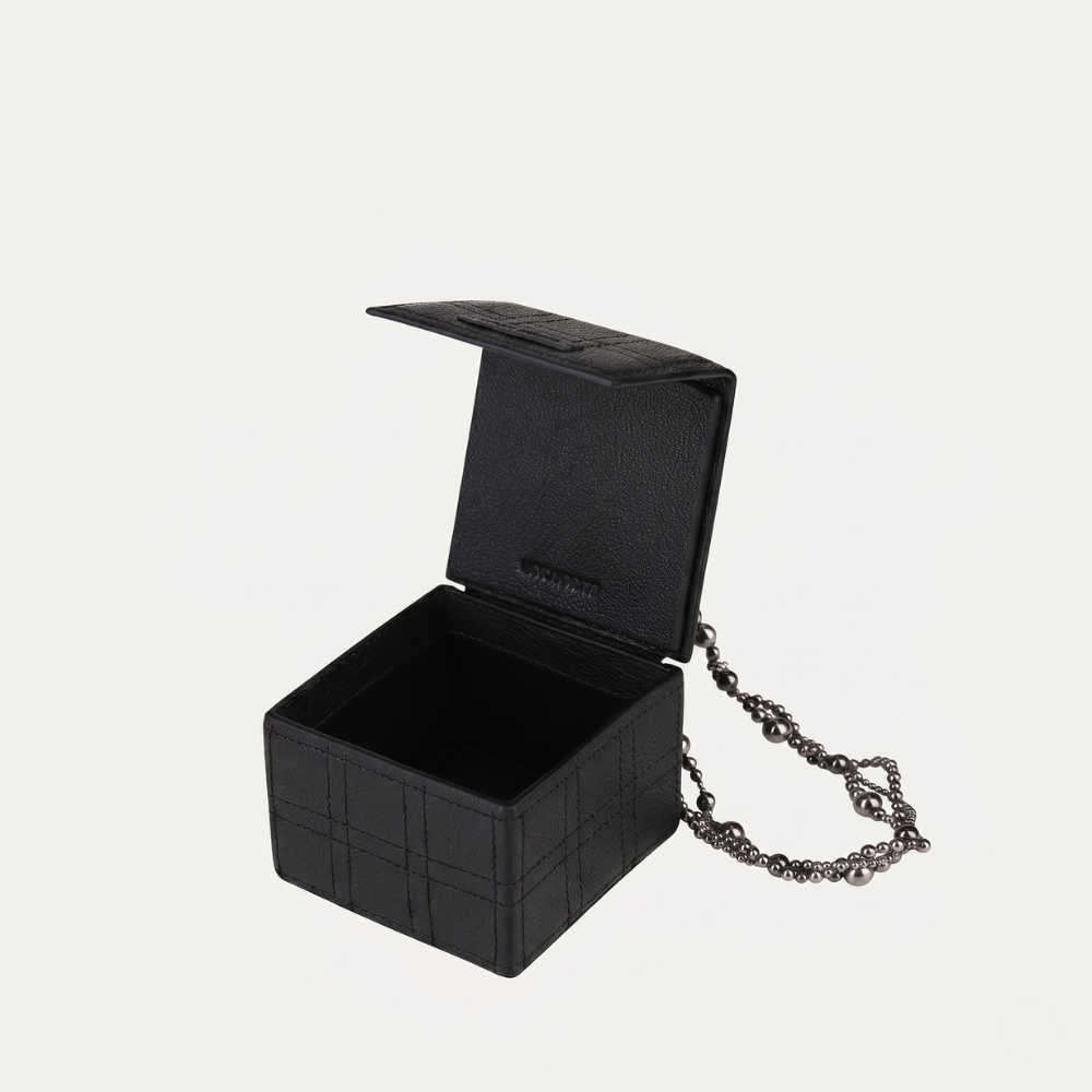 Leather handbag with pearl handle and Swarovski detail, perfect for occasions. Shop online from our curated edit of premium fashion.