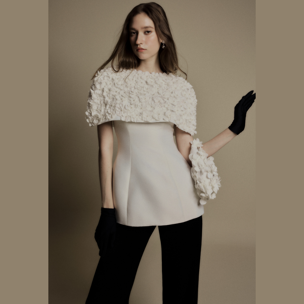 Discover stylish women's upscale clothing featuring the elegant Curve Cami White Top. Shop Now!