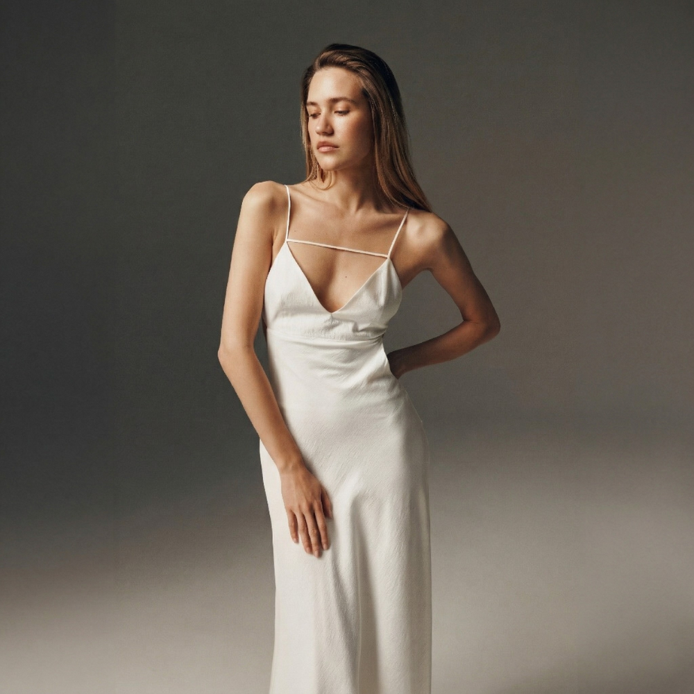 Lightweight dress with a beautiful open back for an effortless, elegant look. Shop now at our exclusive clothing website.