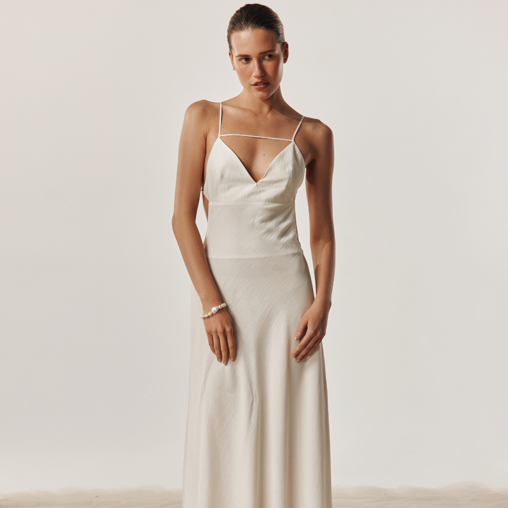 Lightweight dress with a beautiful open back for an effortless, elegant look. Shop now at our exclusive clothing website.