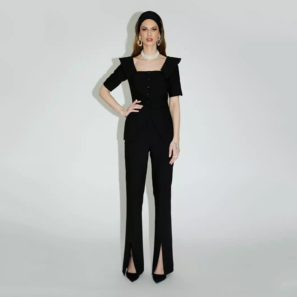 This Danieli Pant in black features a unique front slit.