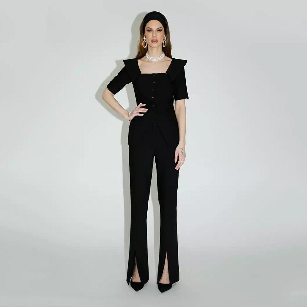 The black Danieli top is made with viscose, polyester, and elastane.