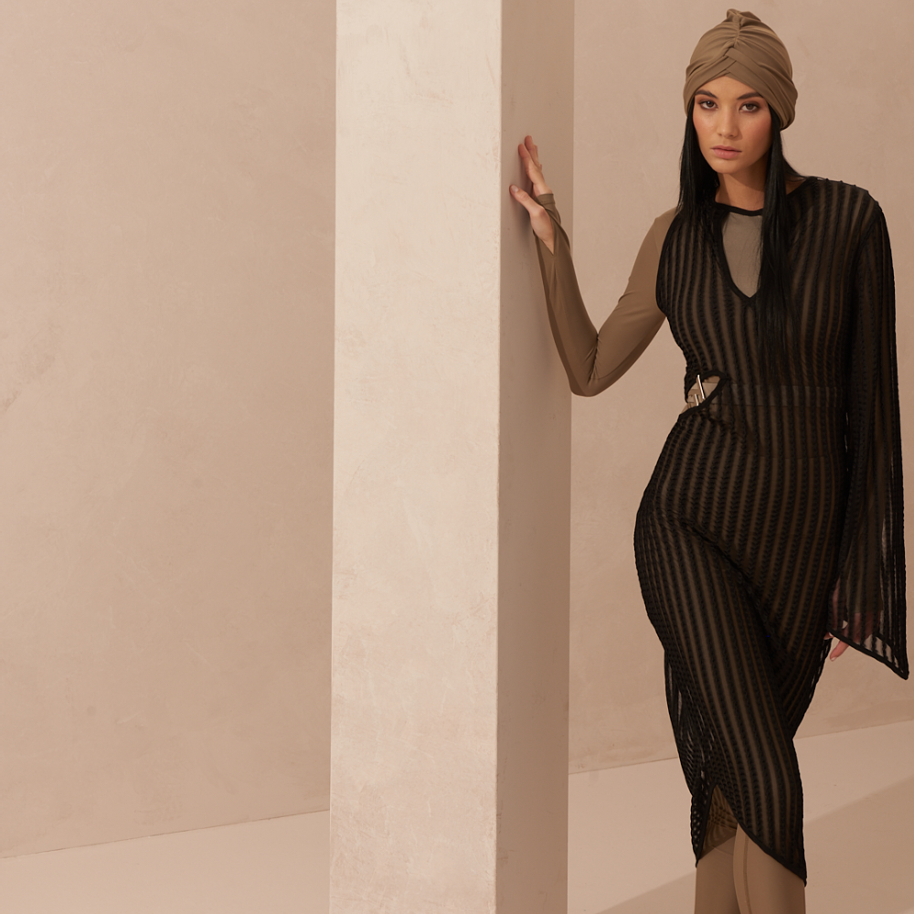 Discover unmatched sophistication with the Daphne Cut-out Dress, a must-have luxury dress. A flawless choice. Shop Now!