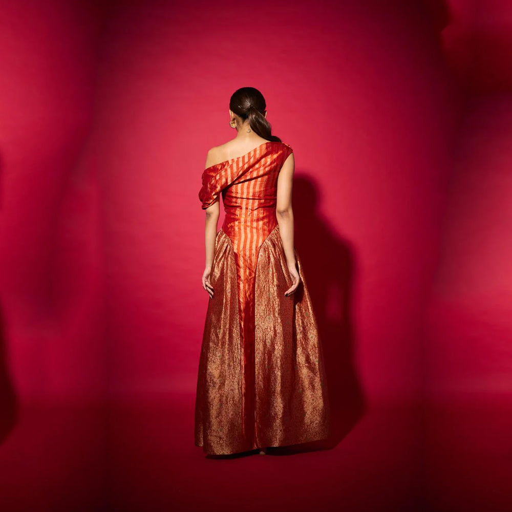 Brocade silk off shoulder dress with ruched sides, perfect for parties and events. Shop online from our curated edit of premium fashion.
