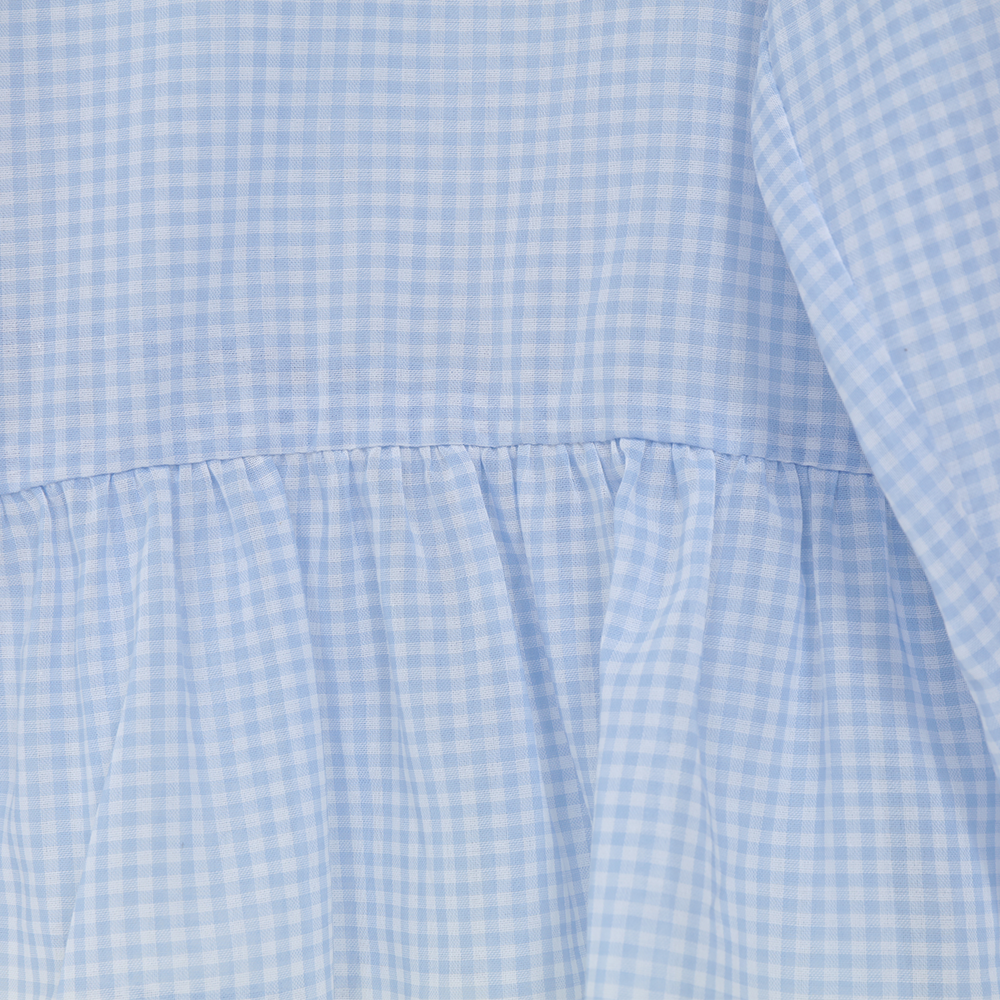 Experience timeless charm with the Doll Shirt, beauty and style in women’s shirts. Shop Now!