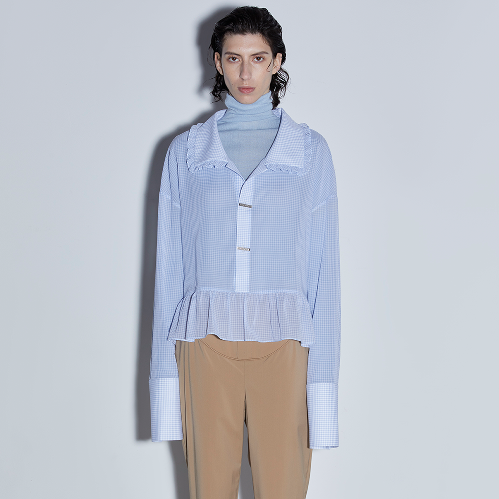 Experience timeless charm with the Doll Shirt, beauty and style in women’s shirts. Shop Now!