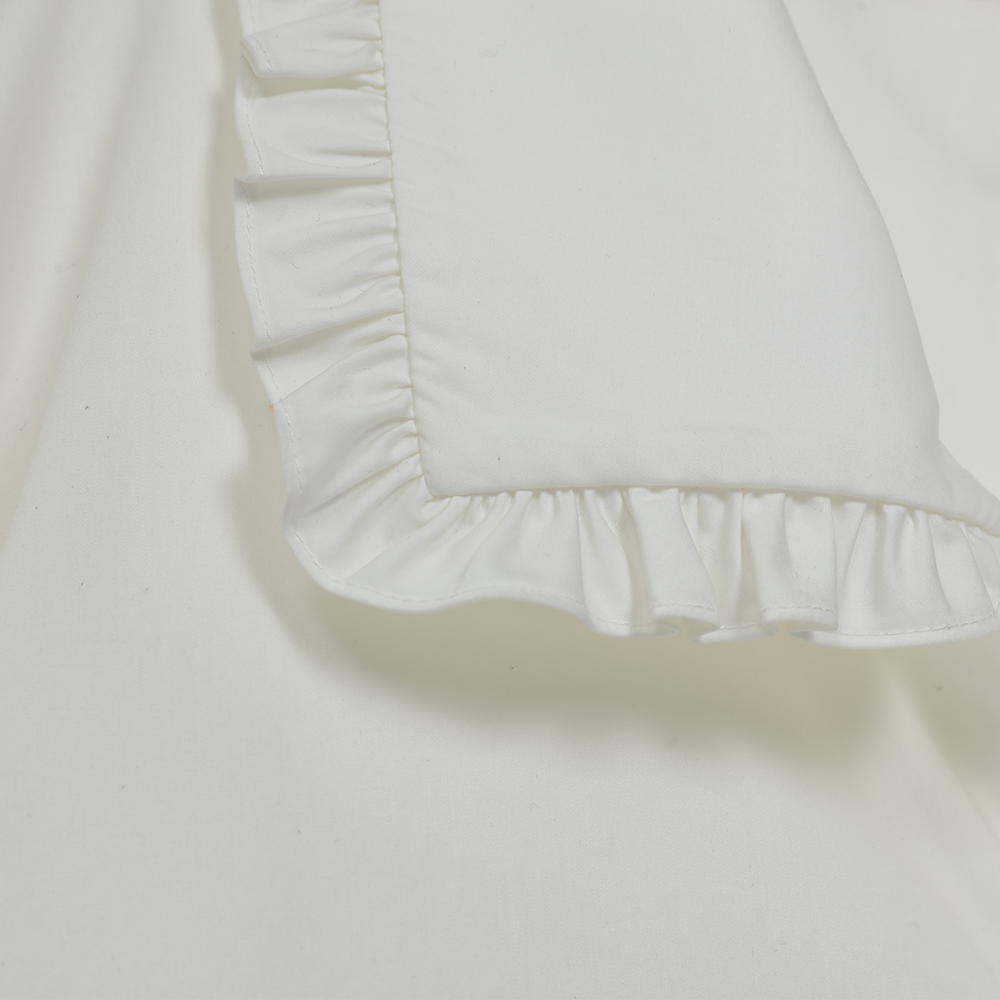 Experience timeless charm with the Doll Shirt, beauty and style in women’s shirts. Shop Now!