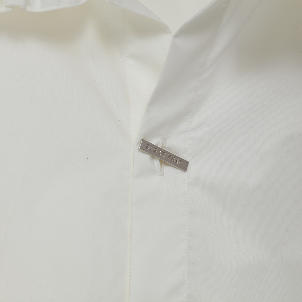 Experience timeless charm with the Doll Shirt, beauty and style in women’s shirts. Shop Now!