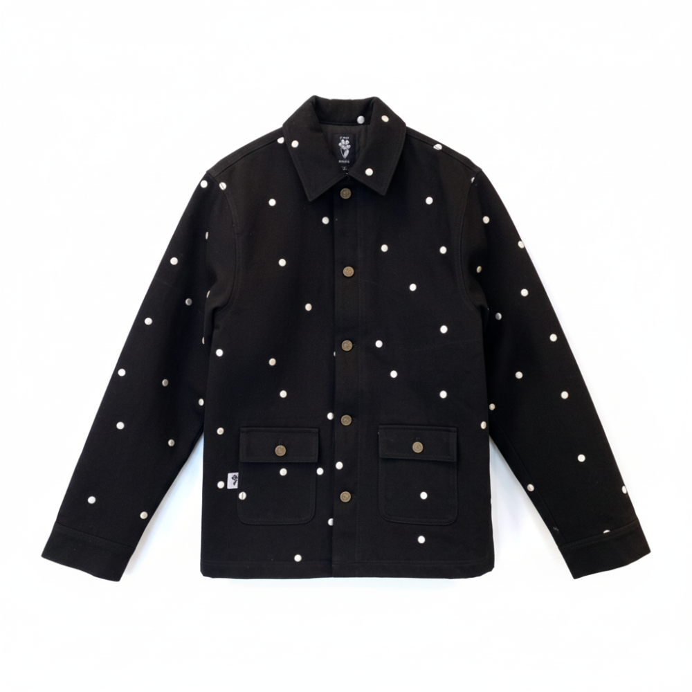 Recycled denim jacket with handmade 3D polka dot embroidery. Bold, playful, and durable. Shop premium styles online.