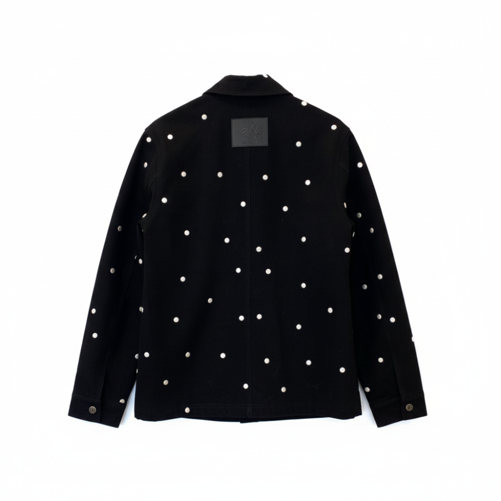 Recycled denim jacket with handmade 3D polka dot embroidery. Bold, playful, and durable. Shop premium styles online.