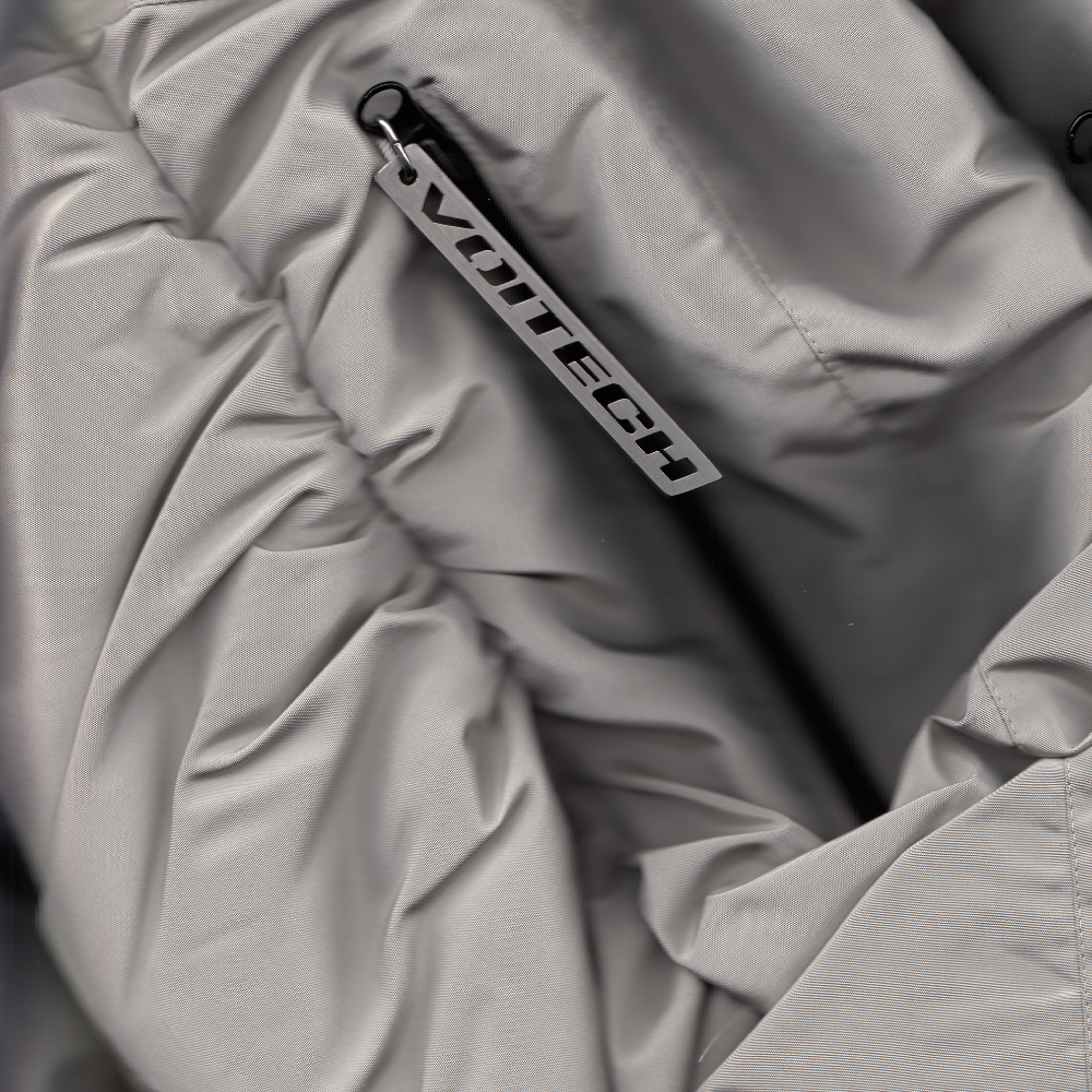 Shop online from our exclusive website. Explore the VOITECH® Downforce Twin Zip Bomber Jacket with an insulated technical shell, signature twin-zip closure, oversized aerodynamic fit, and sculpted performance-inspired design.