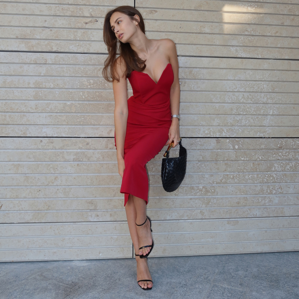 Elegant corset midi dress with built-in cups for a flattering, sculpted fit. Shop now at our exclusive clothing website.