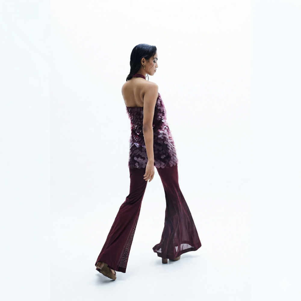 Sequin halter top with flared pants and water sequin detail, perfect for vacations. Shop online from our exclusive collection of premium styles.