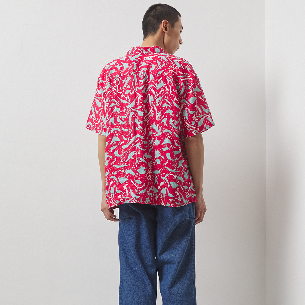 Lightweight bright red, ice blue, and optical white printed 100% linen long-sleeve shirt with a boxy fit. 