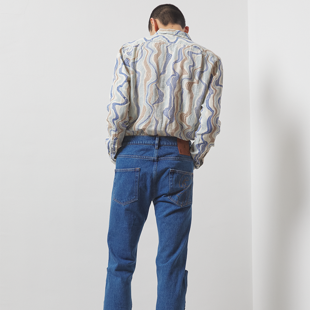Lightweight sand, blue and butter cream printed 100% linen long-sleeve shirt with a boxy fit. 