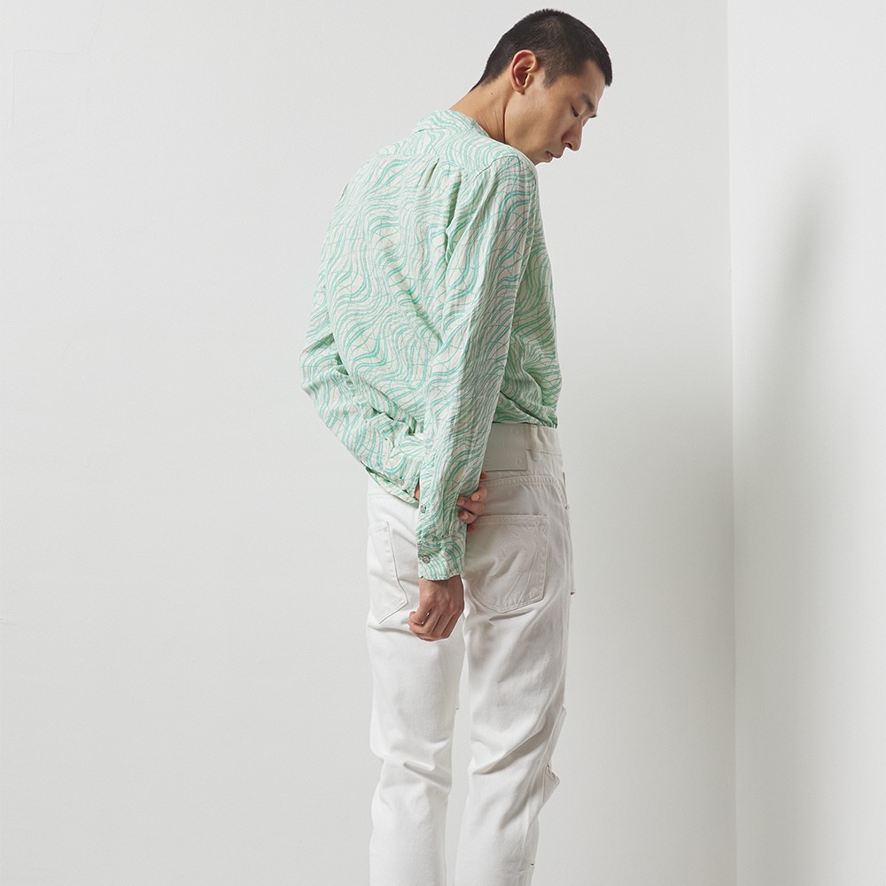 Lightweight seafoam green and off-white printed 100% linen long-sleeve shirt with a boxy fit. 