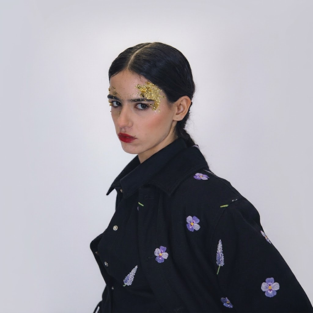 Floral embroidered jacket in recycled denim. Playful, sophisticated, one-of-a-kind. Shop premium styles online.