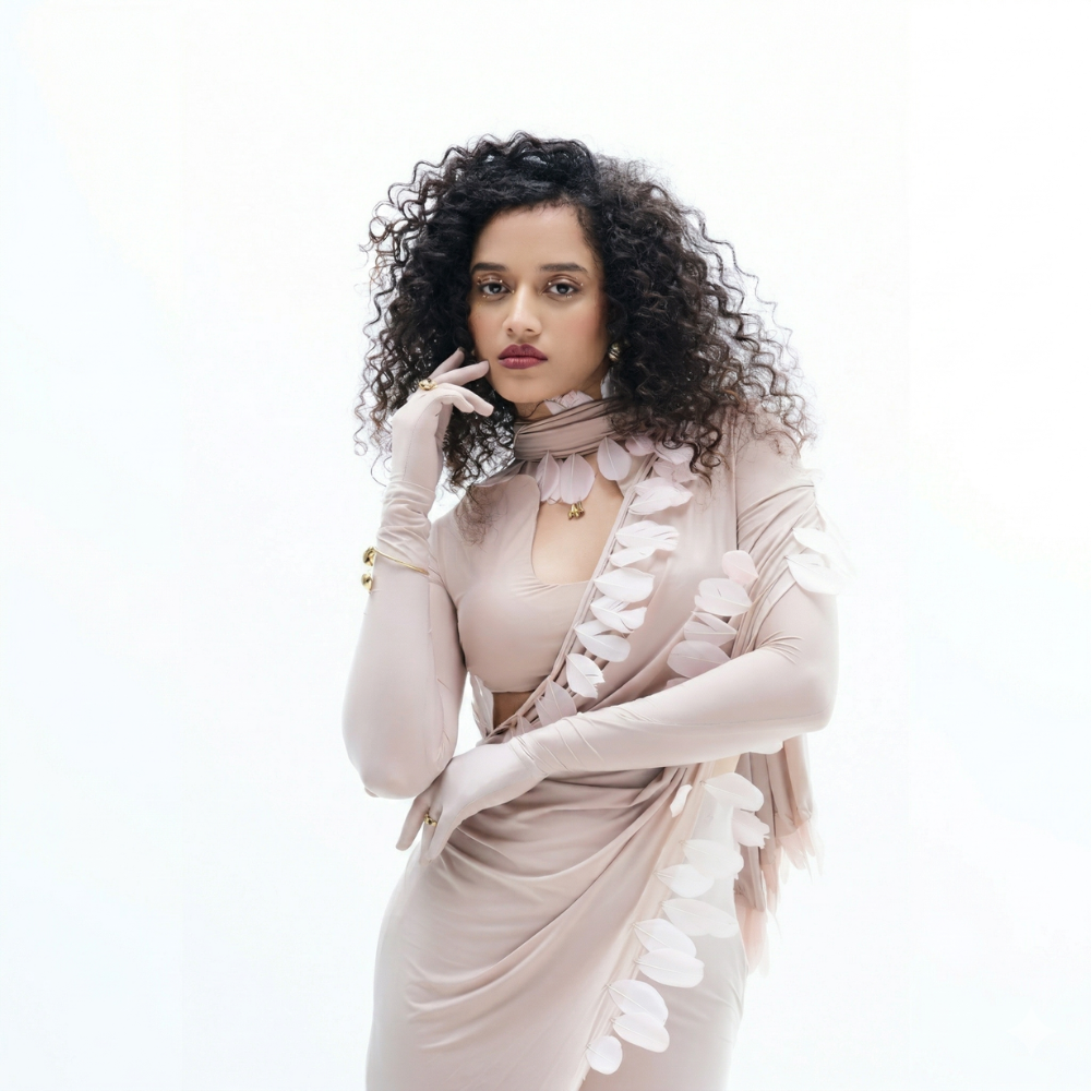 Feather maxi dress with draped shoulder and A-line fit, perfect for brunch and events. Shop online from our exclusive collection of premium styles.