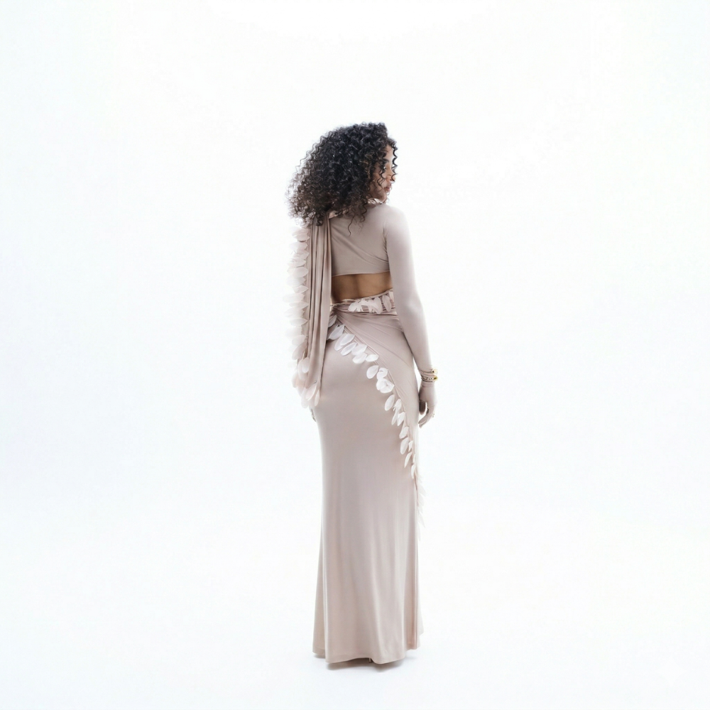 Feather maxi dress with draped shoulder and A-line fit, perfect for brunch and events. Shop online from our exclusive collection of premium styles.