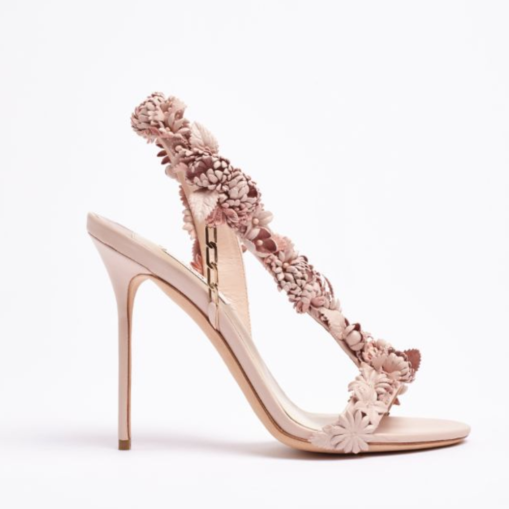 La Piece Unique is a high-heel sandal decorated with three-dimensional flowers in tonal pink nappa leather. 