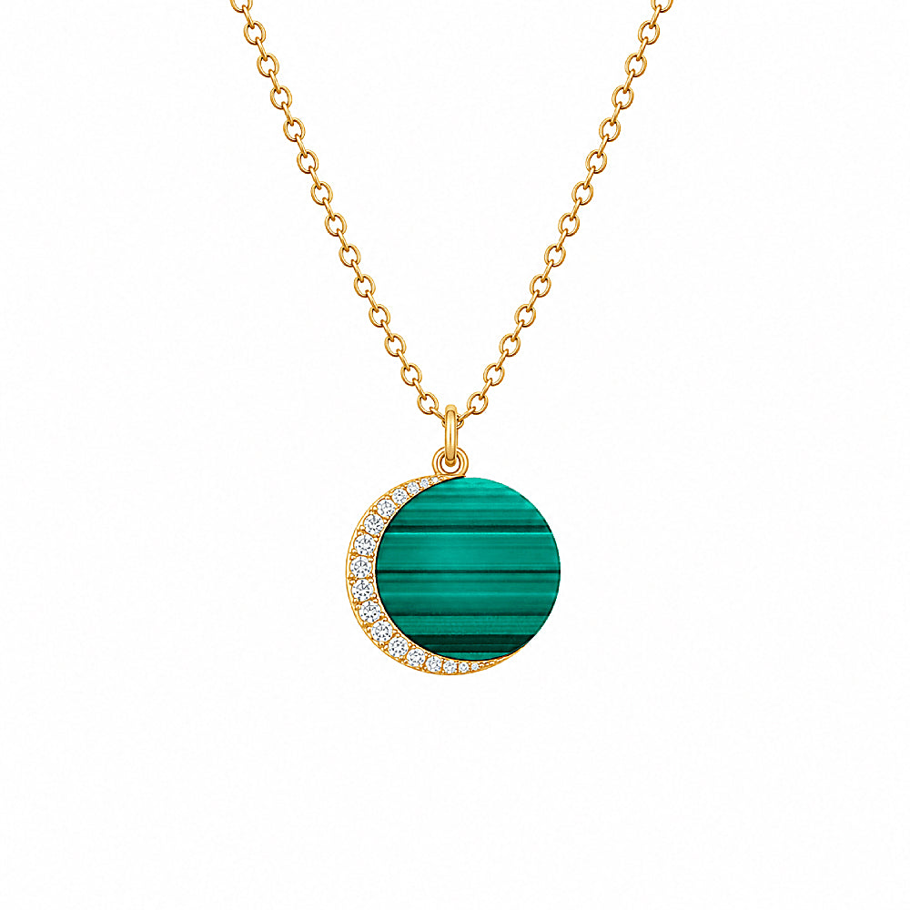 Discover the Emerald Planet Malachite Gold Vermeil Necklace at The Luxe Maison, featuring a rich green malachite stone, gold vermeil detailing, and sparkling CZ accents for a celestial, elegant touch.
