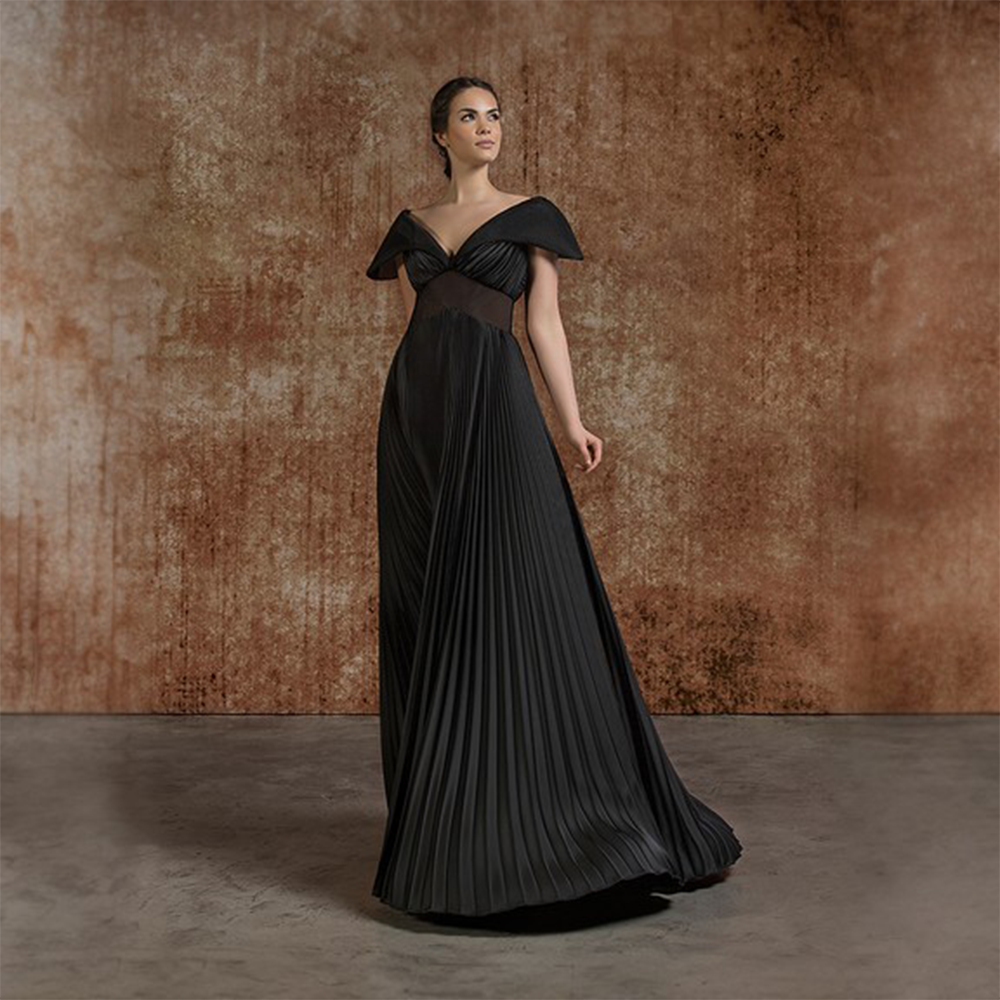 Brique half silk dress with draping on bust and belt fully decorated with beads and embroideries.