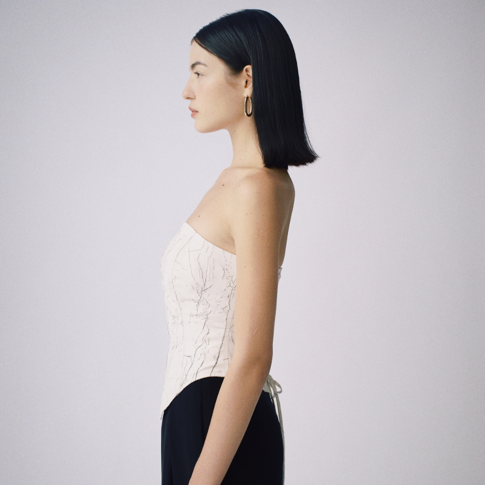 Epiphani Corset blends cotton charm and designer shopping. Shop Now!