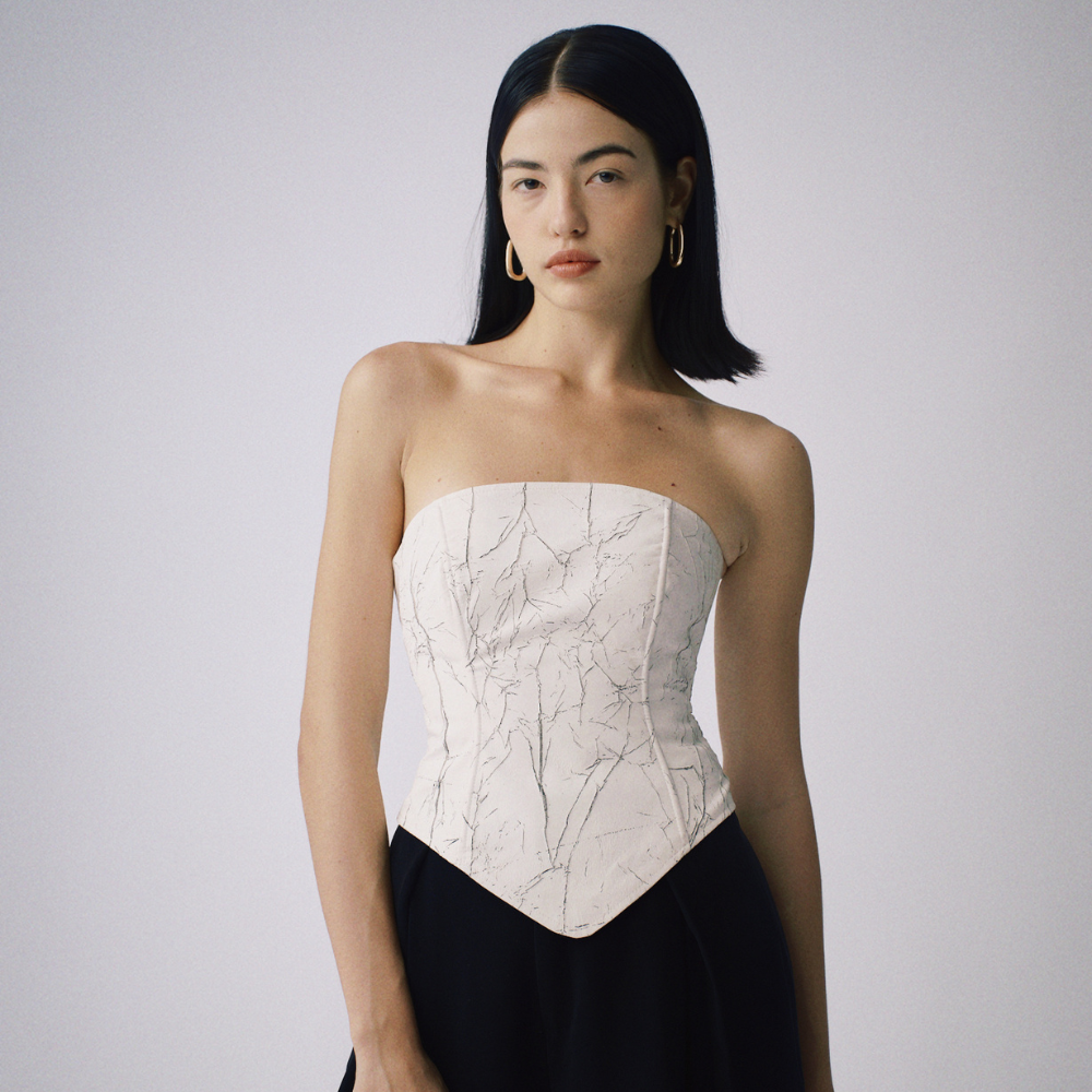 Epiphani Corset blends cotton charm and designer shopping. Shop Now!