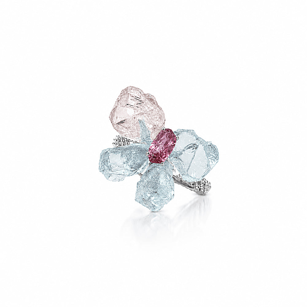 Discover the Eros Aquamarine & Garnet Butterfly Ring at The Luxe Maison, featuring translucent aquamarine butterfly wings accented by a deep garnet centerpiece. Inspired by the Greek myth of Eros and Psyche, this distinctive gemstone ring blends cool blue hues with rich red tones for a romantic, nature-inspired statement.