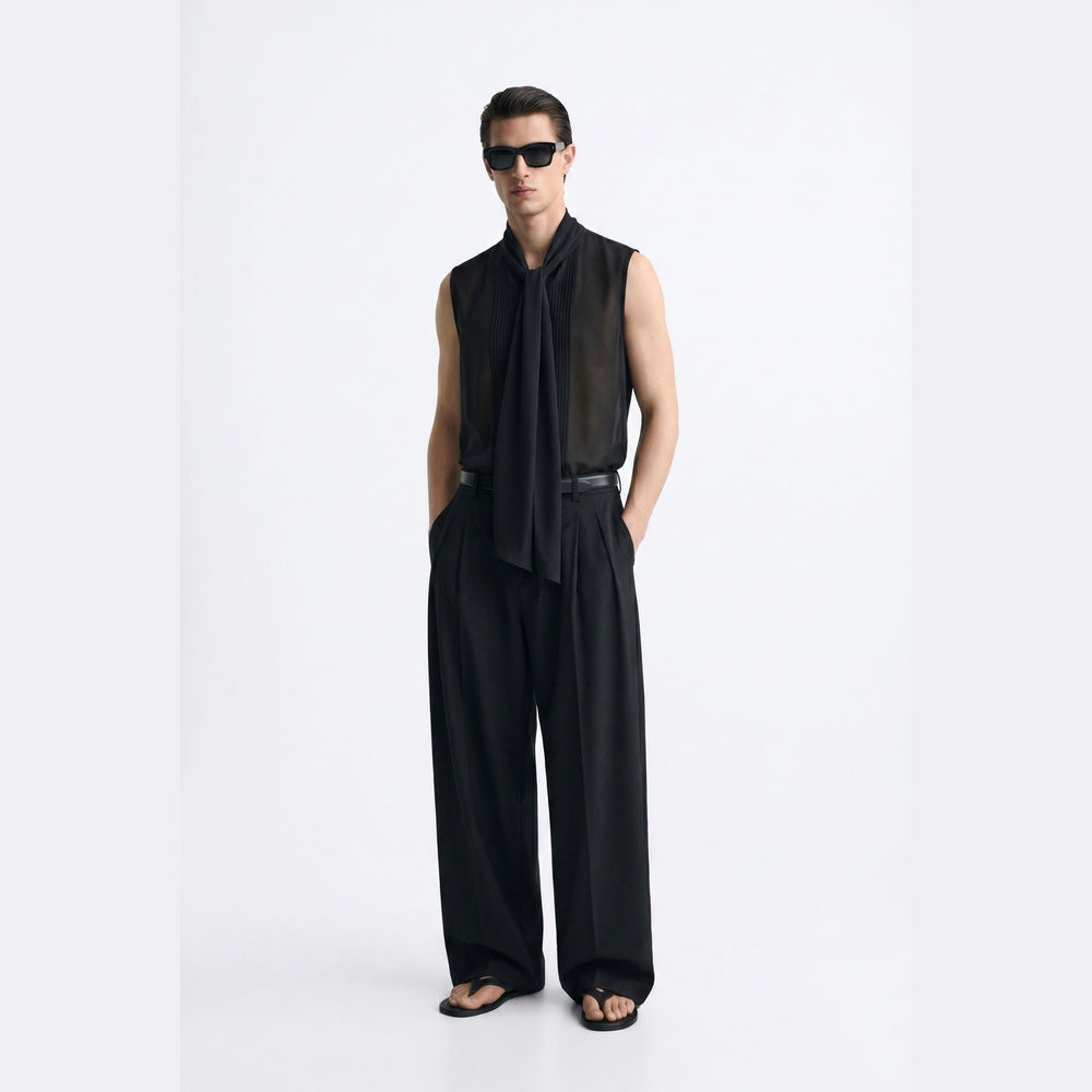 Shop online from our exclusive website and discover the Eucalyptus Silk Sleeveless Scarf Shirt, crafted from sustainable eucalyptus silk for a lightweight, breathable, and modern elegant silhouette.