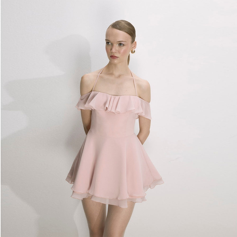 Explore the Evie Mini Dress in our clothing shop for timeless charm Shop Now!