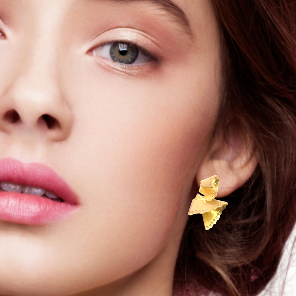 Shop online premium 18K gold earrings with sparkling cubic zirconia embellishments.