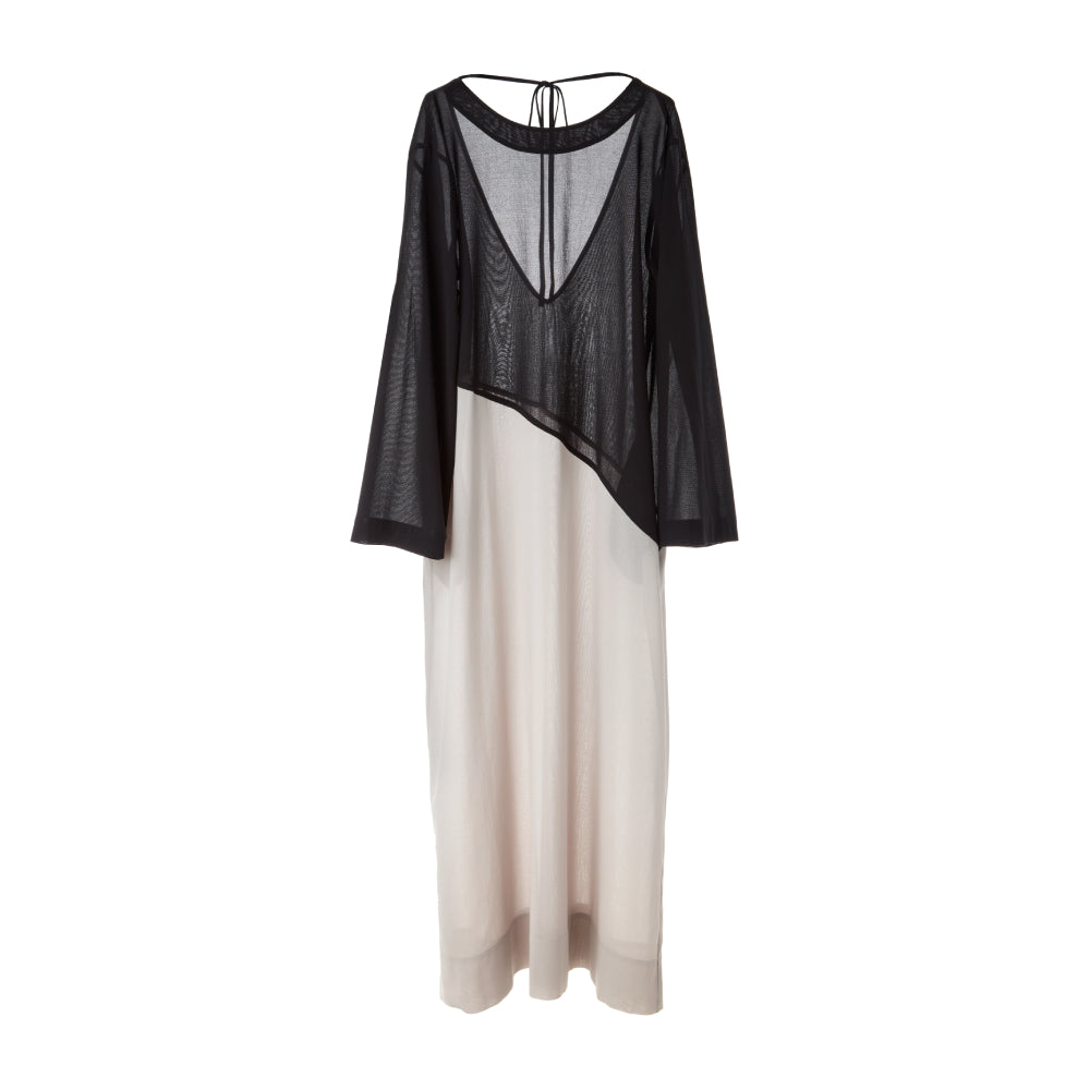 Discover the Faye Caftan Colourblock at The Luxe Maison, featuring contrasting panels, a deep V-back, long trumpet sleeves, and practical side pockets.