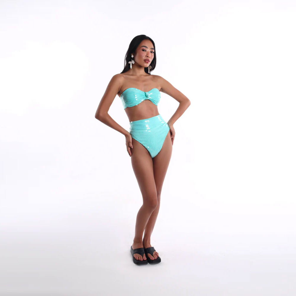 Aqua 3 piece set with sequin bandeau and ruffle overlay, perfect for beachwear. Shop online from our curated edit of premium fashion.
