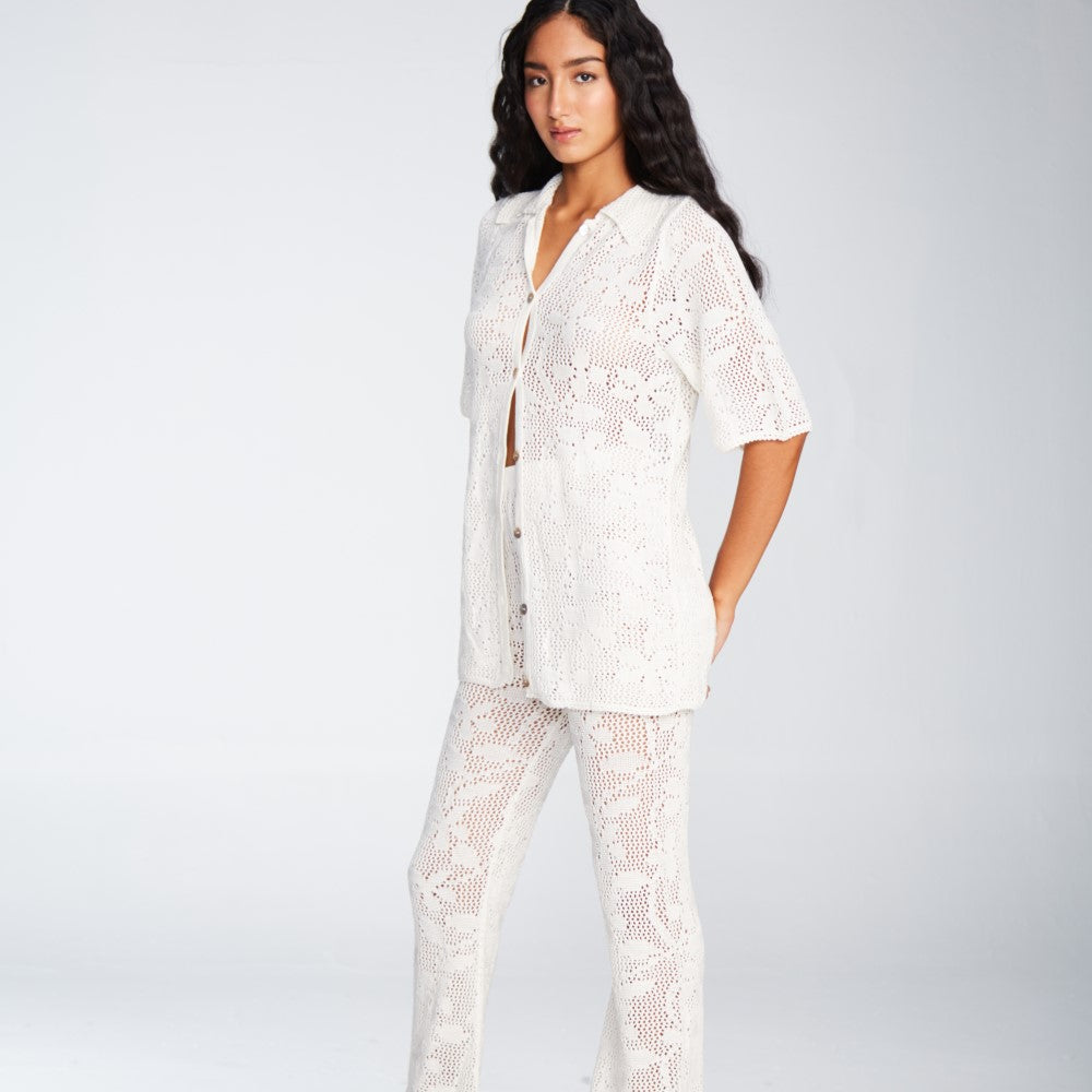 Discover the graceful Flavia White Pant when you shop online. Shop Now!