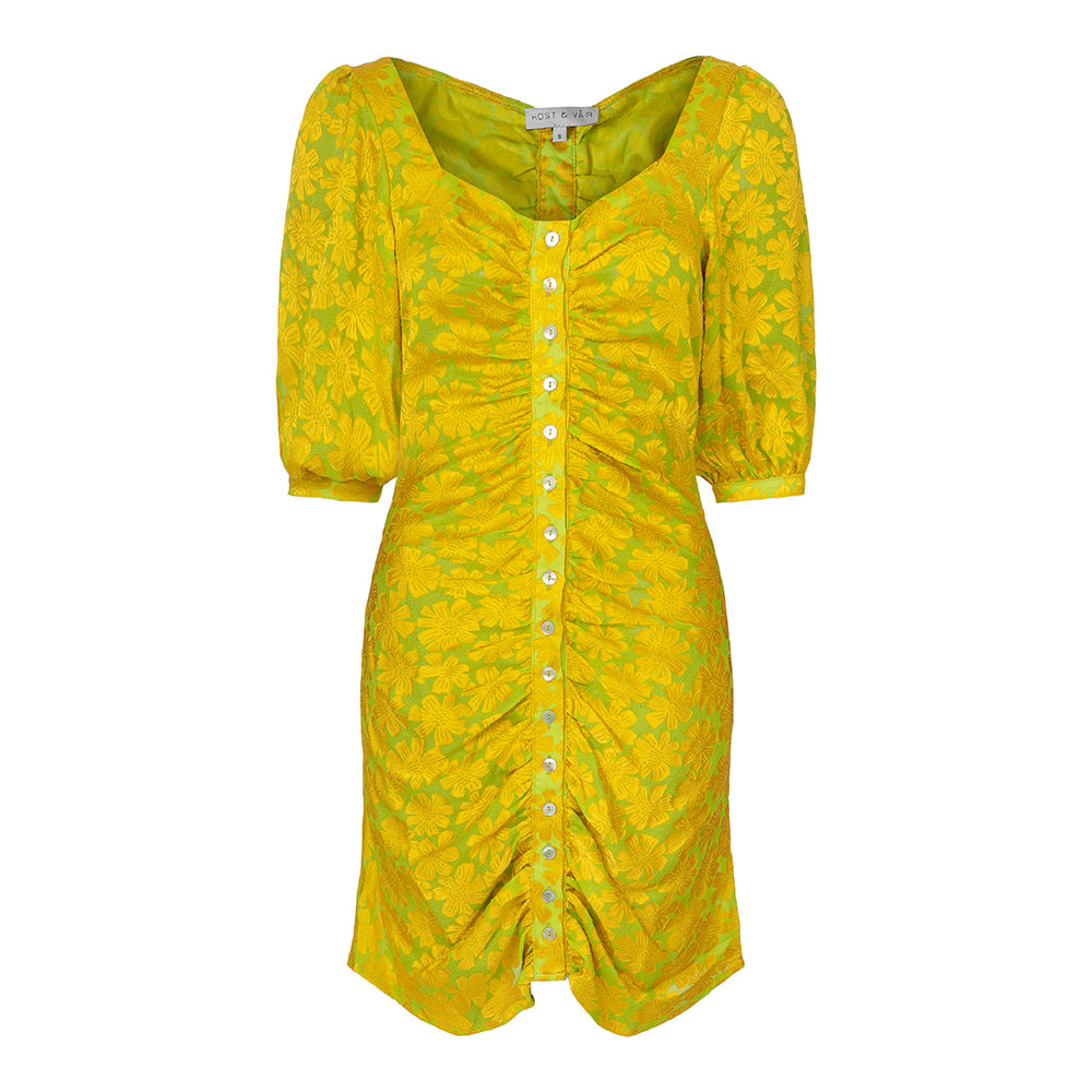 Shop the Fleur Short Dress, a chic and elegant piece in women's wear. Perfect for any occasion. Refresh wardrobe with timeless style and Shop Now!