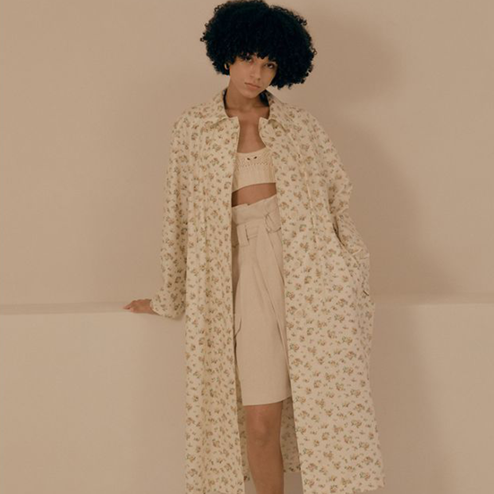 Raw-edged, Round neckline One side handkerchief-hem with patch pocket Adjustable tie belt at waist Relaxed silhouette.