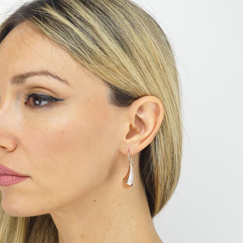 Shop online premium rose gold plated teardrop earrings with pyramidal crystal and sparkling cubic zirconia accents for elegant everyday styling.