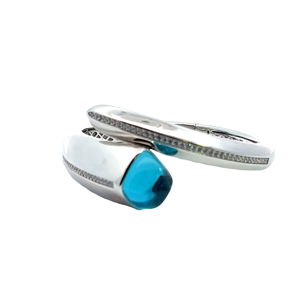 Elegant rhodium plated cuff bracelet with a colored pyramidal crystal and sparkling pavé cubic zirconia accents. A chic luxe accessory for every occasion. Shop premium jewelry online.