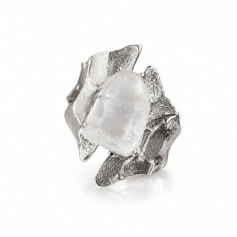 Discover the Glacier Chunky Silver & Clear Quartz Ring at The Luxe Maison, featuring a substantial clear quartz crystal set in a sleek silver frame with an adjustable band. Inspired by the strength and beauty of frozen landscapes, this bold statement ring combines modern minimalism with natural elegance.