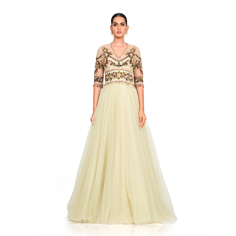 Patch Work Embroidery with tassel on sleeves l Keyhole back l V neck.