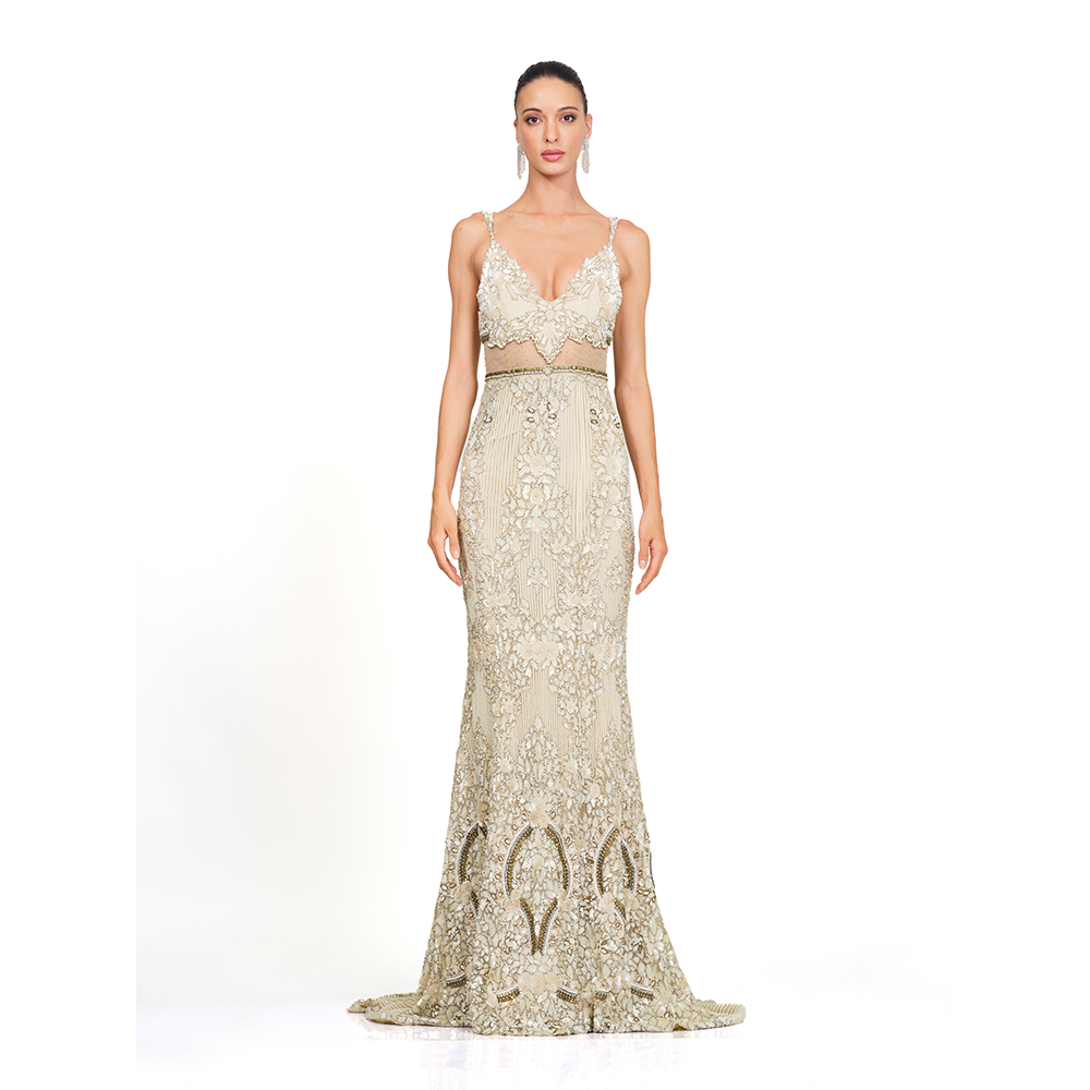 Sequins embroidery l Plunging neckline l Waist cut-out l Fitted silhouette l Floor sweeping trail l Centre back zip closure.