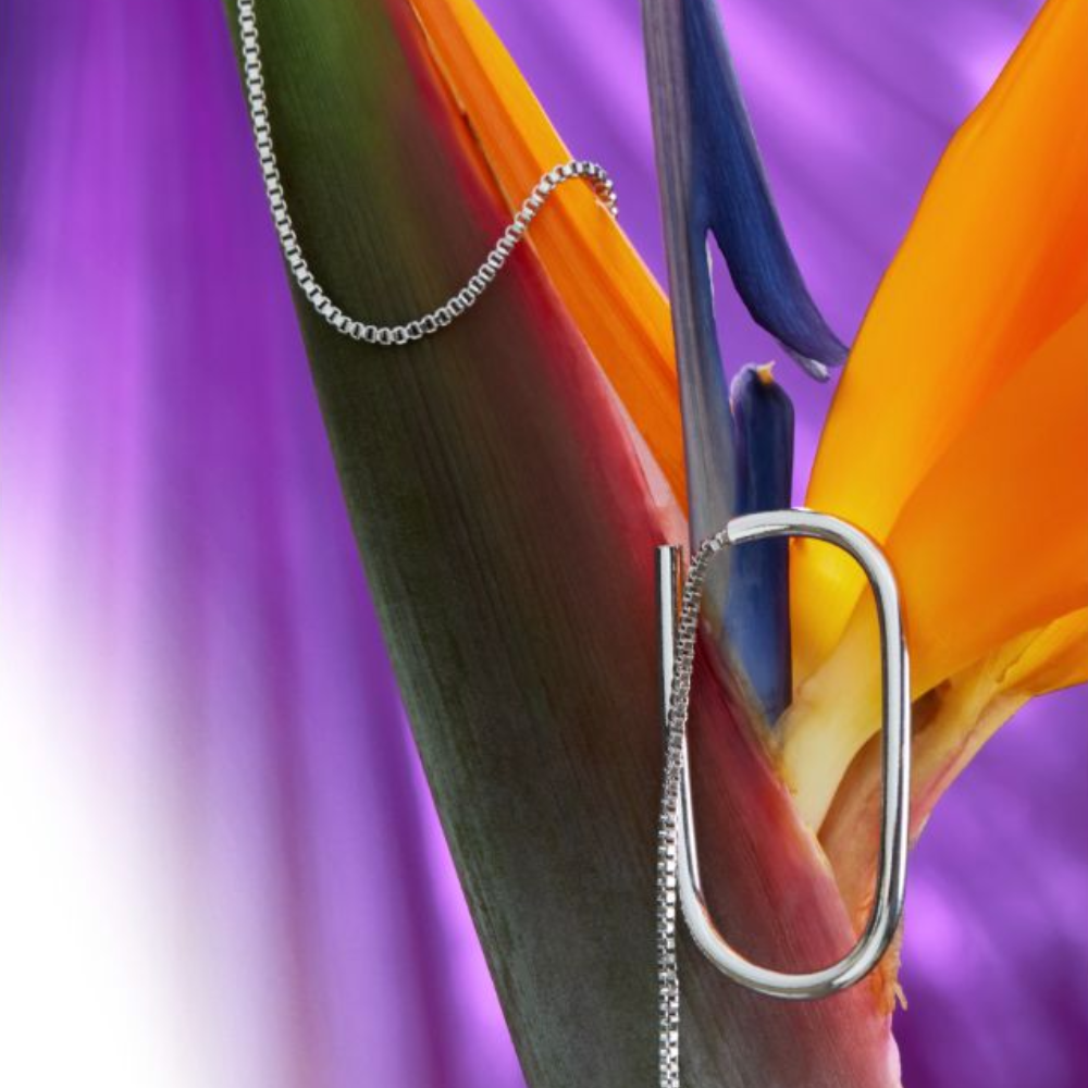 Gold or silver tone plated brasss large link and chain earring.