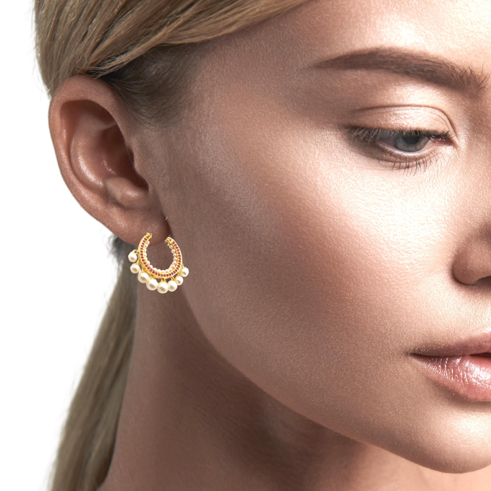 Shop online premium 18K gold pearl hoop earrings with ruby accents and dangling pearls.