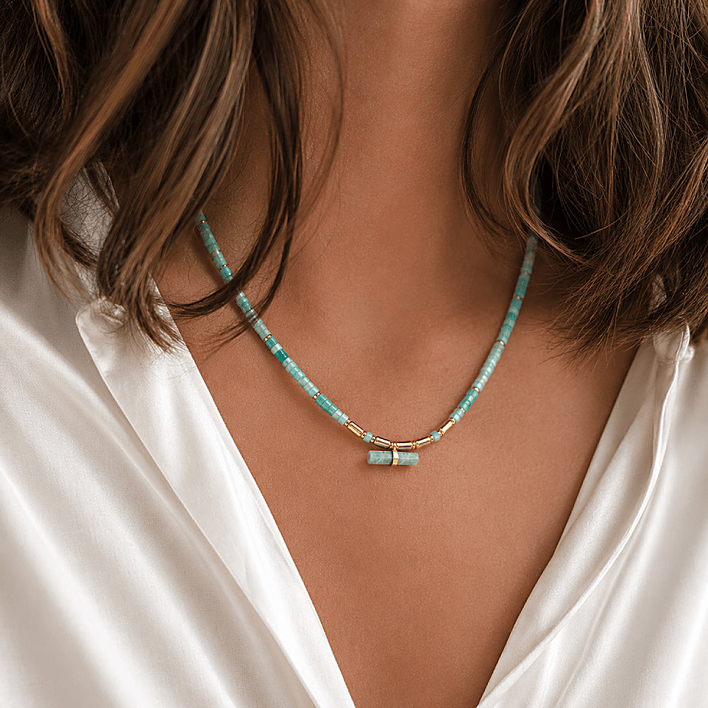 Discover the Hebe Amazonite T-Bar Necklace at The Luxe Maison, featuring serene green amazonite beads and a minimalist T-bar pendant for a modern, elegant look inspired by renewal and harmony.