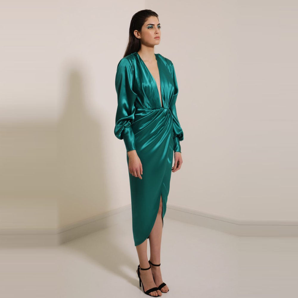 Deep square neckline, draped dress with puff sleeves, and crossover skirt with flattering folds - ankle length -100% silk. 