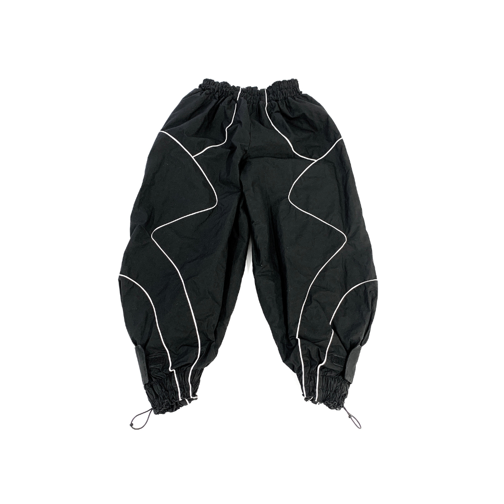 Shop online from our exclusive website and discover the Hyperloop Track Pants by Voitech®, featuring lightweight technical fabric, ergonomic paneling, and an aerodynamic futuristic streetwear design.