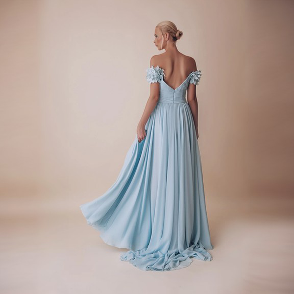 Off shoulder, falling sleeves with fitted bodice and heavy flared lower bodice.